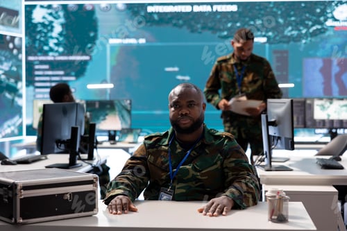 Preview: Military command center with soldier conducting a high security videoconference