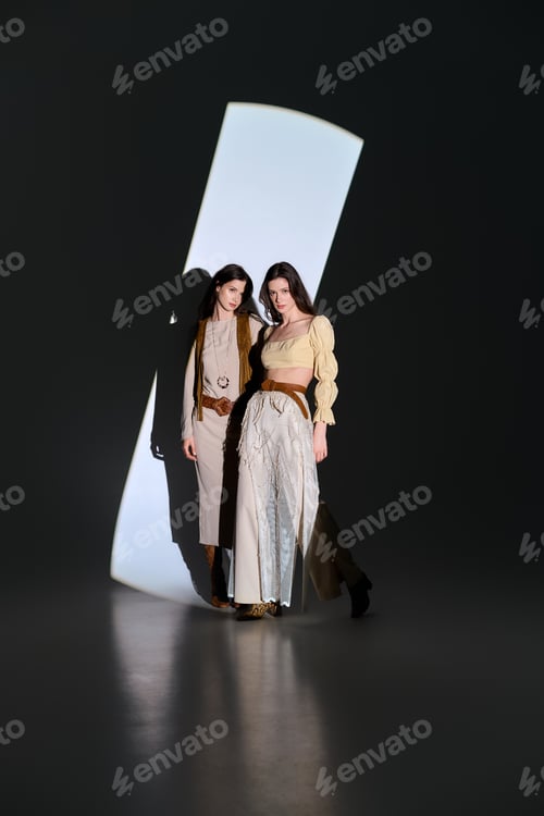 Preview: Stylish twin sisters showcase their unique fashion sense in an artistic setting