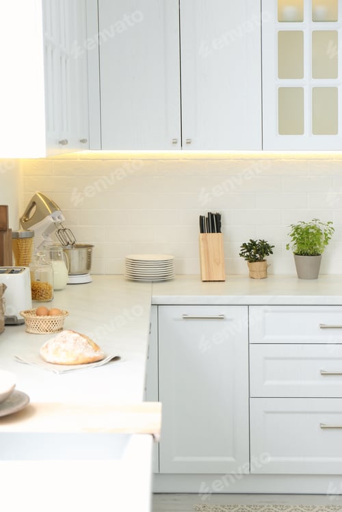 Preview: Modern kitchen interior with stylish white furniture