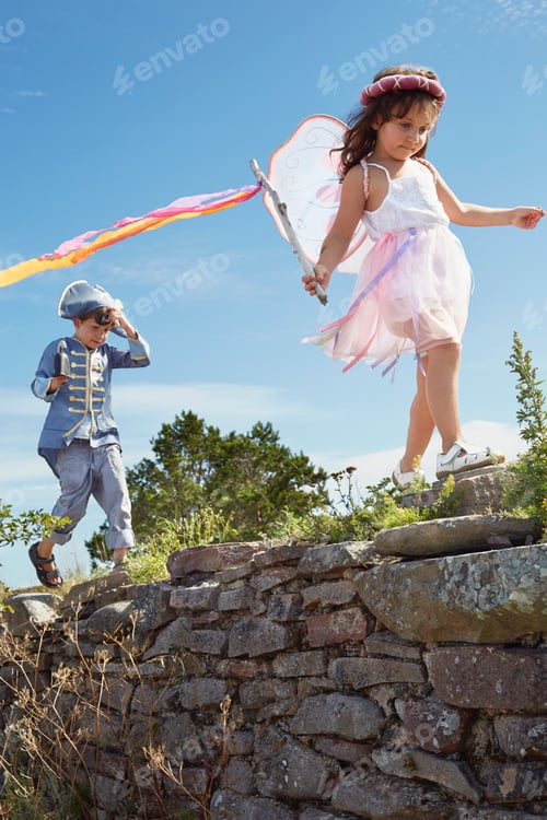 Preview: Children playing in costumes on a sunny day