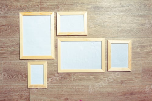Preview: photo frames on the wooden wall