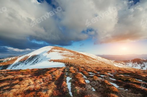 Preview: Spring mountain landscape. Snowy Mountains