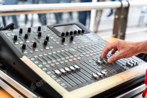 Preview: Sound engineer working with a professional sound console