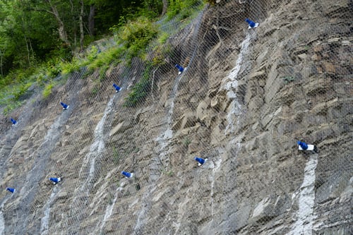Preview: Landslide and rock sliding prevention in Georgia, reinforcing mountain slope with metal mesh.
