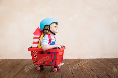 Preview: Happy child playing at home