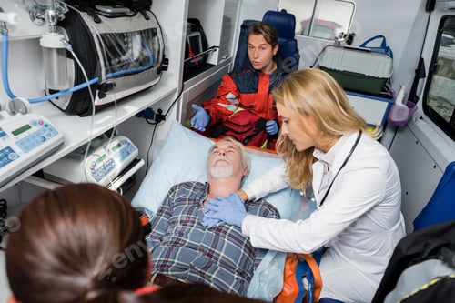 Preview: Selective focus of doctor in latex gloves doing cardiopulmonary resuscitation to patient near