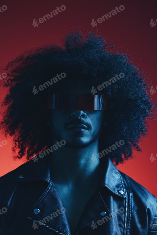 Preview: Portrait of fashion man with curly hair on red background with stylish glasses, multicultural