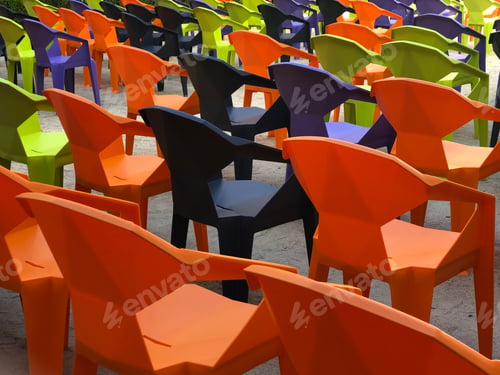 Preview: colorful chairs at outdoor concert or conference event