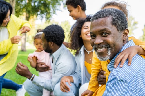 Preview: Beautiful happy african american family bonding at the park