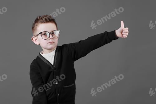 Preview: Boy Giving a Thumbs Up in Black Cardigan
