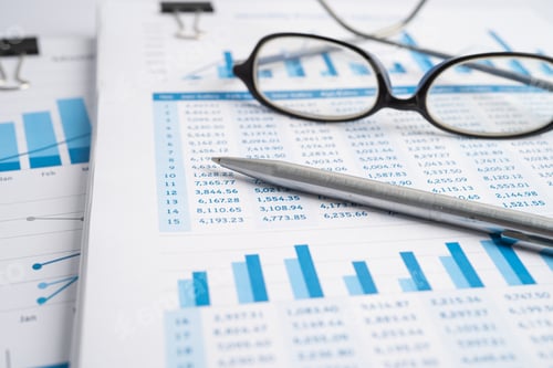 Preview: Pen on chart graph static data paper for analysis account business trade.