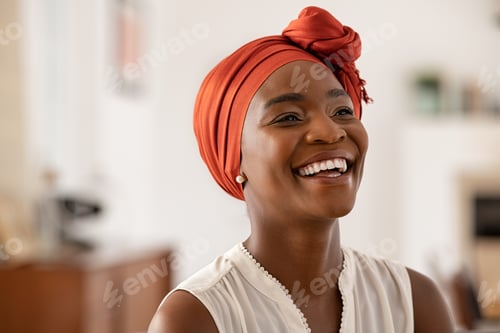 Preview: Cheerful african woman wearing trendy red headscarf