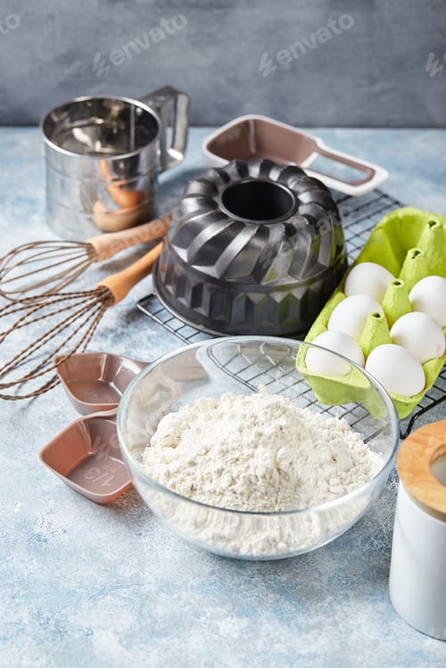 Preview: Baking ingredients and utensils, flour, eggs, baking dish.