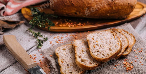 Preview: Sliced rye bread on a wooden table