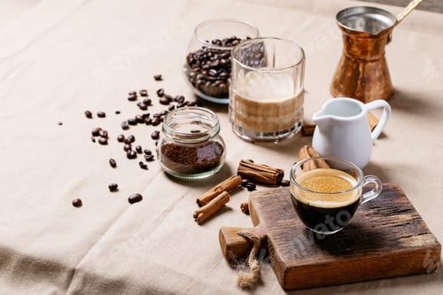 Dark Espresso with Cinnamon and Coffee Beans