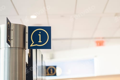 Preview: Closeup shot of a blue information sign on the side of a metal pole