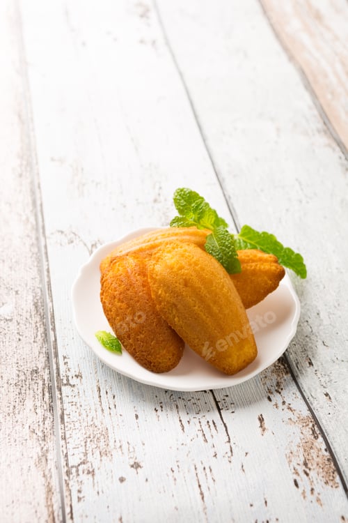 Preview: Delicious Madeleines on a Rustic Wooden Table