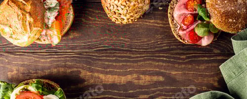 Preview: Assorted sandwiches on wooden table