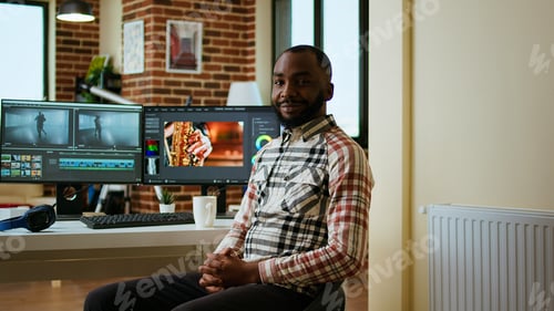 Preview: African american male filmmaker works with creative editing software