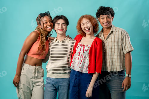 Preview: Portrait of diverse Generation Z friends posing on isolated blue screen.