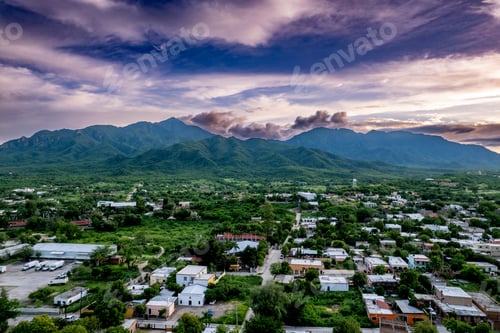 Preview: Beautiful cityscape view with cloudy sky at sunset