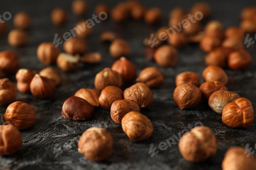 Preview: Healthy food and healthy nutrition concept, nuts - hazelnut
