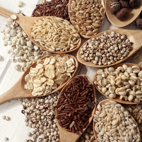 Preview: Cereals In The Spoons On The White Wooden Table Background