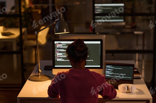 Preview: Programmer working in IT office during deadline