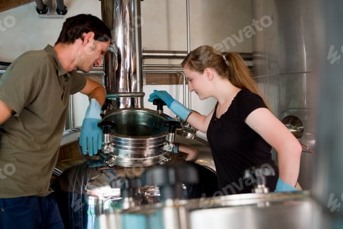 Preview: Female brewer working in brewhouse
