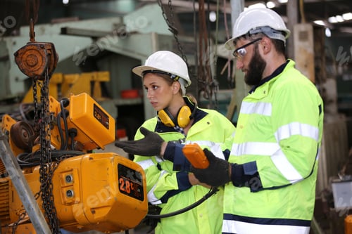 Preview: Portrait woman worker and engineer under inspection and checking production process on factory.