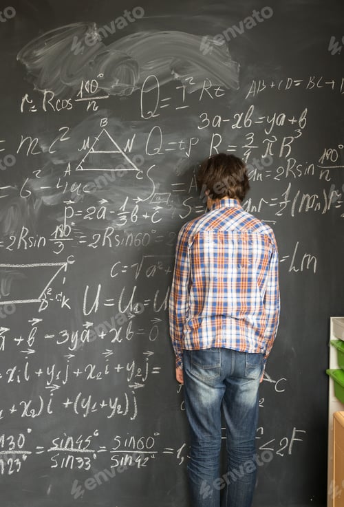 Preview: Boy writting on black board
