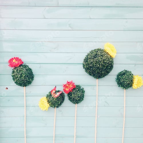 Preview: Spring plants and butterflies on a light blue wood background