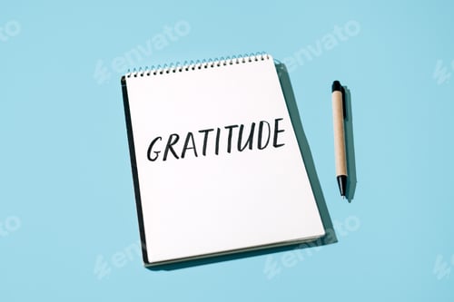 Preview: How to Practice Gratitude. Word Gratitude in open notebook on table.