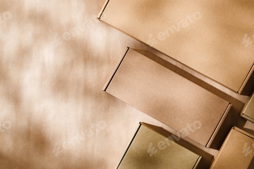 Preview: Brown cardboard boxes arranged on a neutral background in a warehouse setting during daylight hours