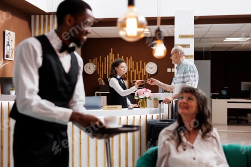 Preview: Welcoming hotel reception for check-in