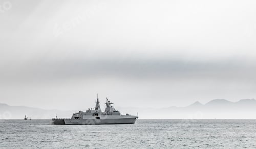 Preview: Wide shot of a ship sailing on the water on a cloudy day