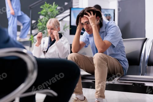 Preview: Asian patient being exhausted and stressed during checkup visit appointment while waiting for