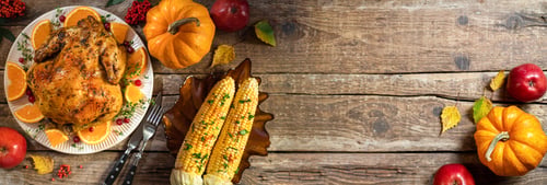 Preview: Autumn festive Thanksgiving background. Baked chicken or turkey, festive food for Thanksgiving