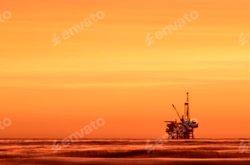 Preview: Bright orange sunset illuminates an oil rig in the Santa Barbara Channel in California