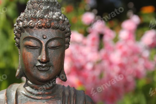 Preview: Buddha Statue in Outdoor Garden With Blurred Background