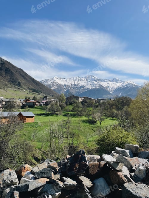 Preview: Mountain view in sunny day.Travel and tourism. Explore Georgia.Scenery of houses and mountains
