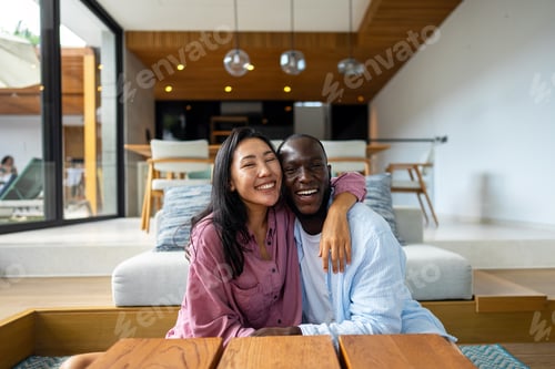 Preview: Joyful African-Asian couple embracing their diverse backgrounds, celebrating togetherness, identity