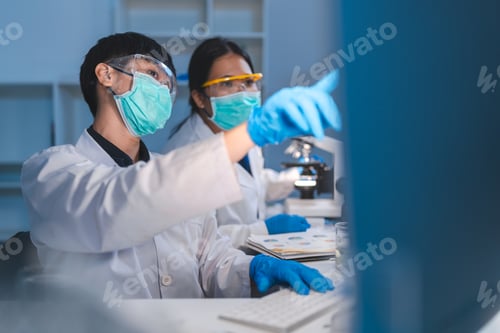 Preview: researcher working in laboratory for medicals science research using scientific equipment technology