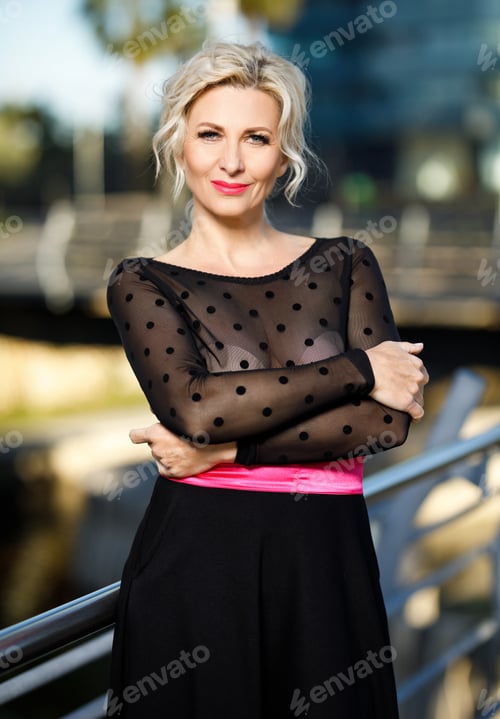 Preview: Outdoorsdors Portrait Of Adult Elegant Woman Outdoors.