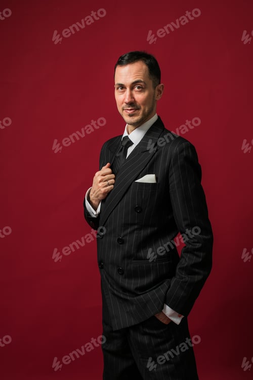 Preview: Handsome man in dark double-breasted jacket