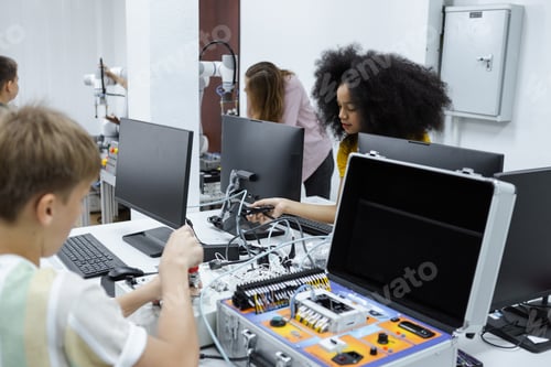 Preview: Students boy learning electrical appliances. education on table at class room