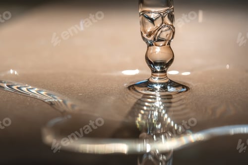 Preview: A pipette of cosmetic gel on a beige background.