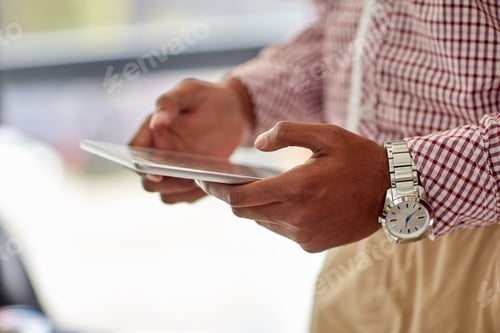 Preview: businessman with tablet pc at office