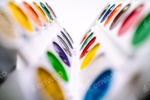 Preview: Colored pencils in a pencil case on white background