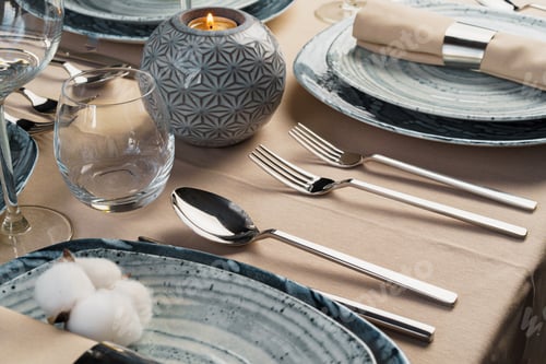 Preview: Table setting with stylish dishware on beige tablecloth